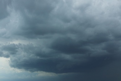 Photo of Sky with heavy rainy clouds on grey day