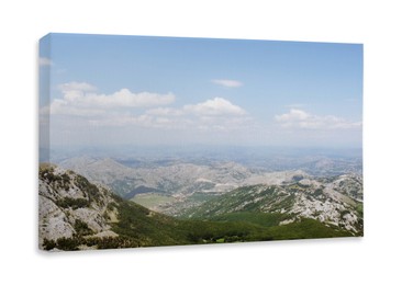 Image of Photo printed on canvas, white background. Picturesque view of beautiful mountains on sunny day