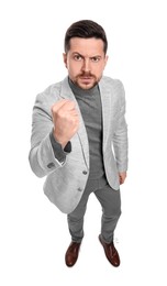 Photo of Emotional bearded businessman in suit on white background, above view