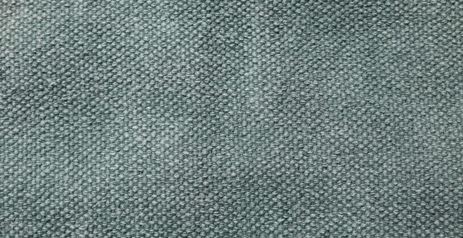 Photo of Texture of grey fabric as background, top view