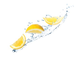 Fresh ripe lemon and splashing water on white background