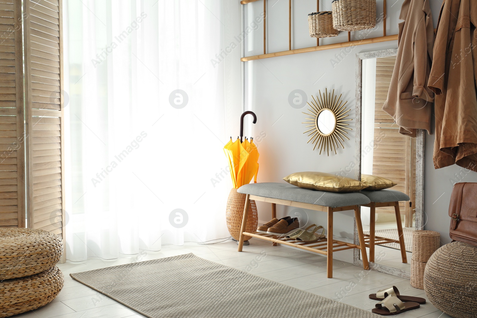 Photo of Cozy hallway interior with new stylish furniture