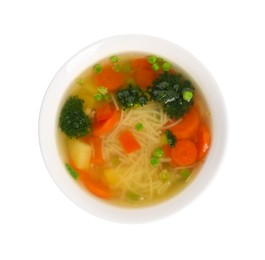Photo of Delicious vegetable soup with noodles isolated on white, top view