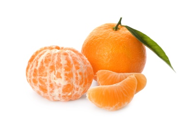 Fresh tangerines with green leaf on white background