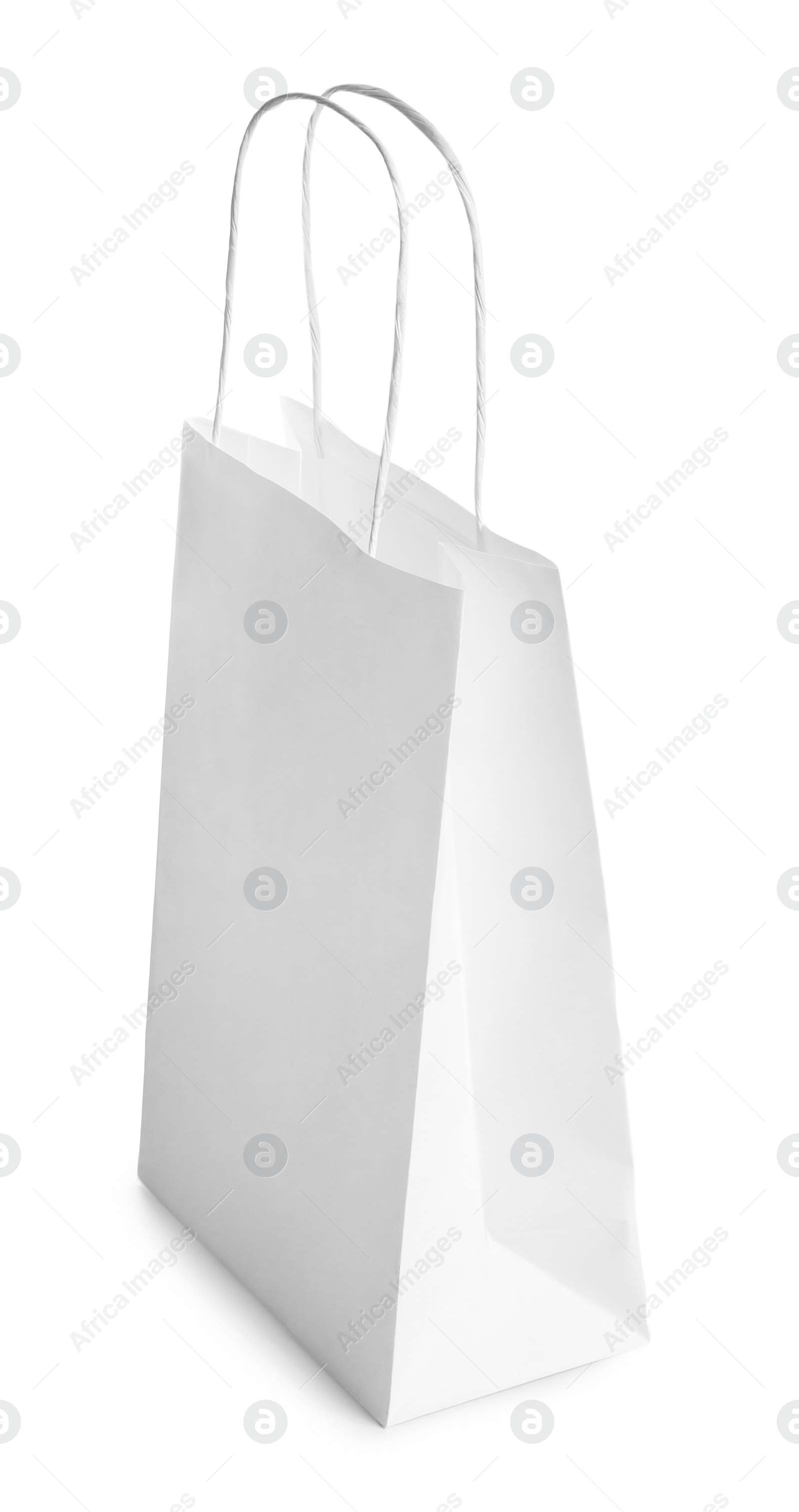 Photo of One paper bag isolated on white. Mockup for design