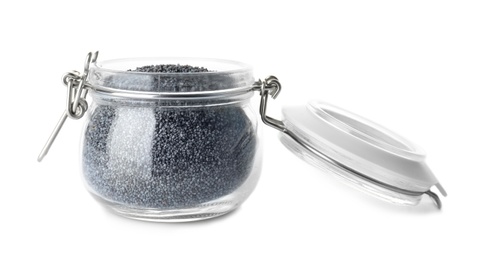 Poppy seeds in glass jar on white background