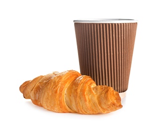 Photo of Tasty croissant and cup of coffee on white background