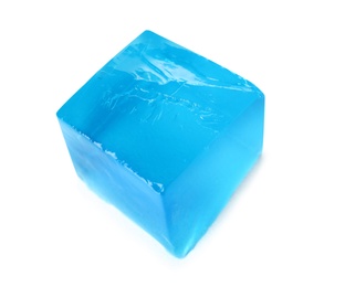 Photo of Delicious blue jelly cube on white background