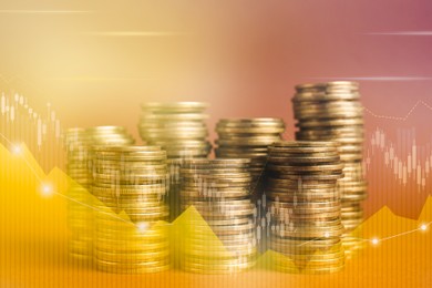 Double exposure of stacked coins and charts on color background