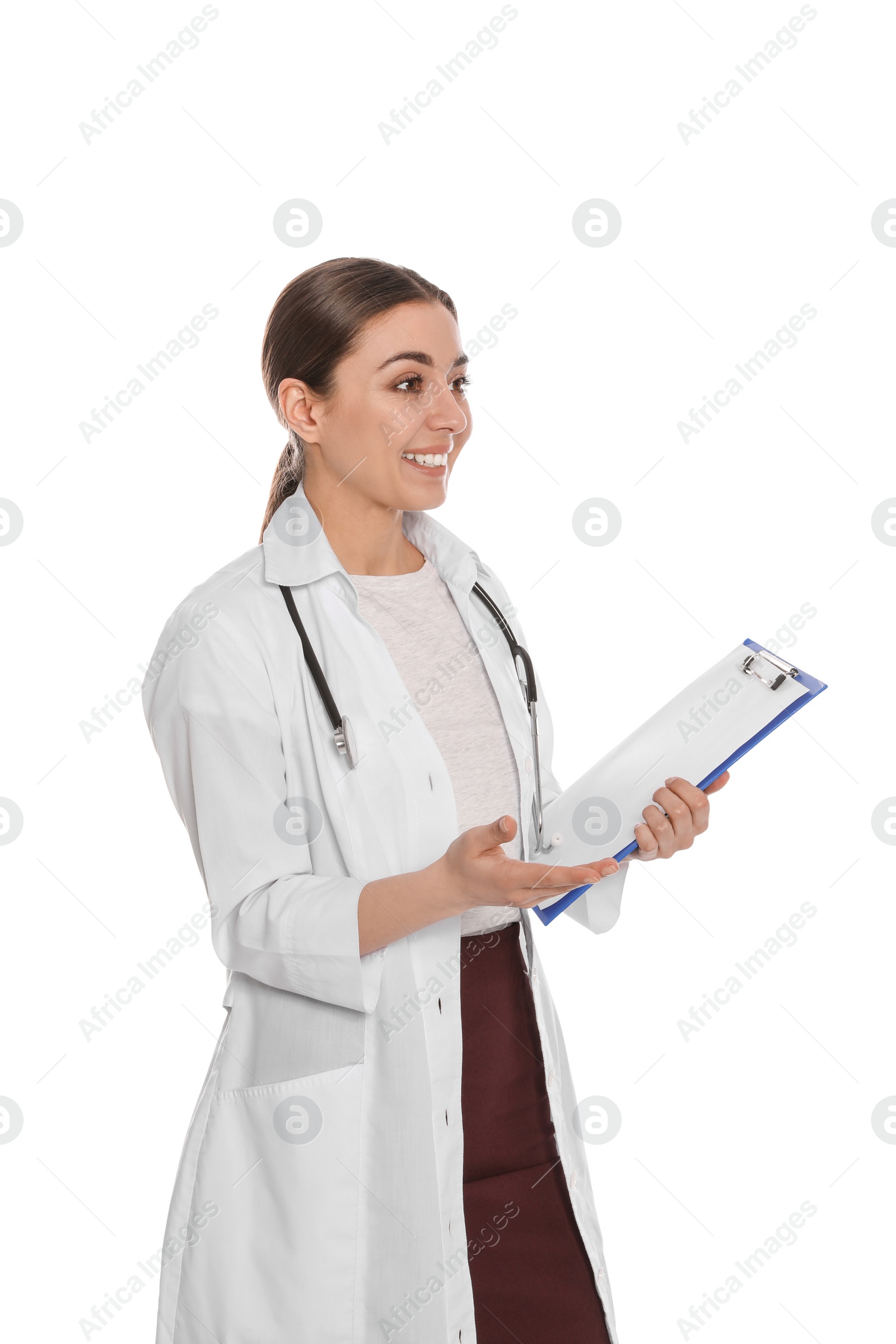 Photo of Portrait of medical doctor with clipboard and stethoscope isolated on white