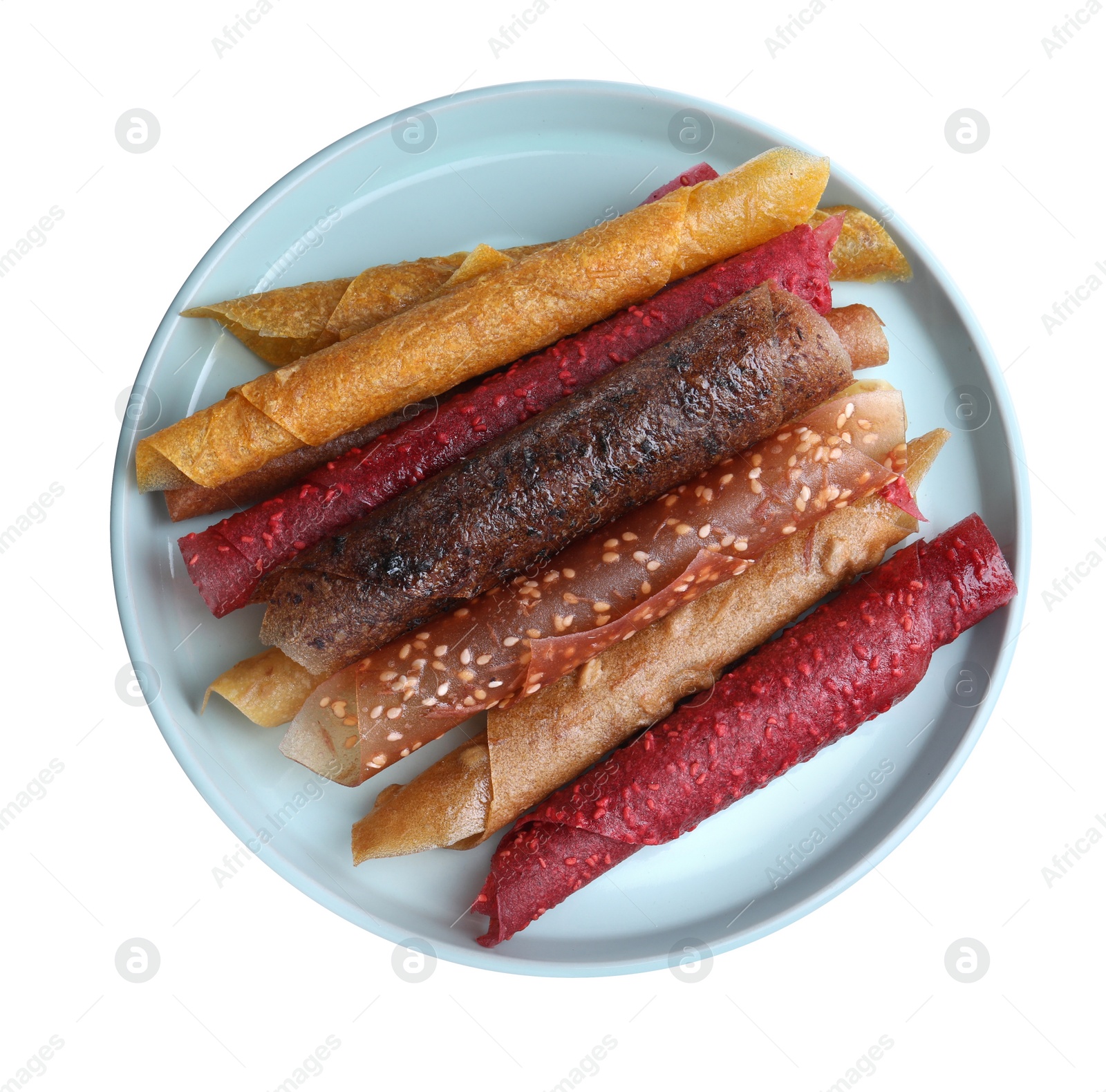 Photo of Delicious fruit leather rolls on white background, top view