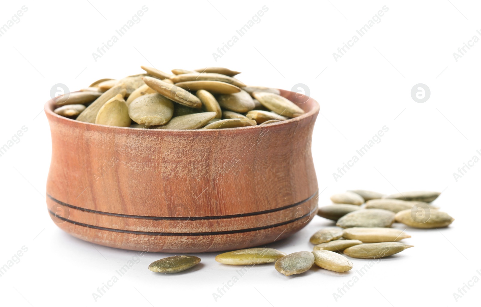 Photo of Bowl with raw pumpkin seeds on white background