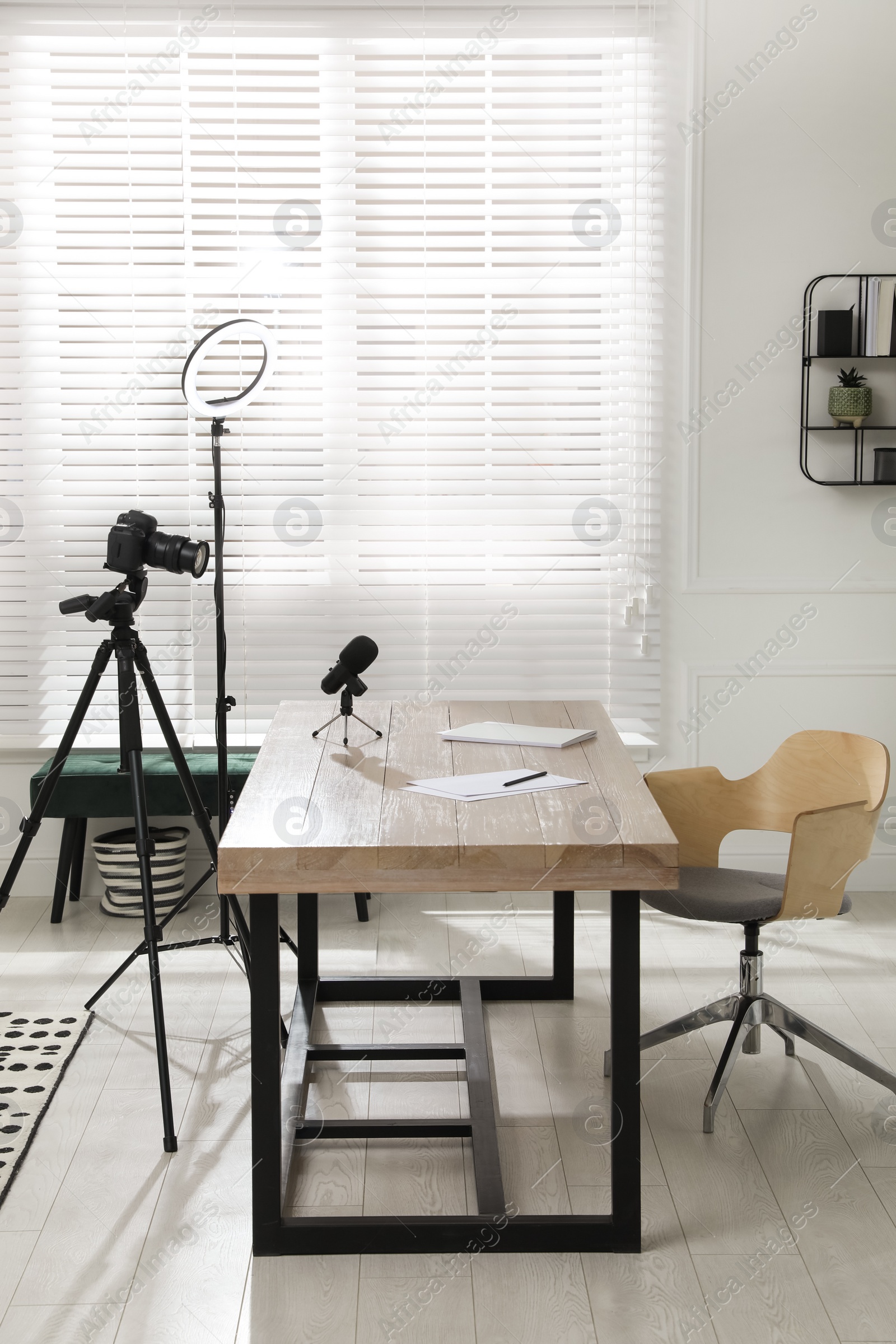 Photo of Ring light, camera and microphone for blogging in room