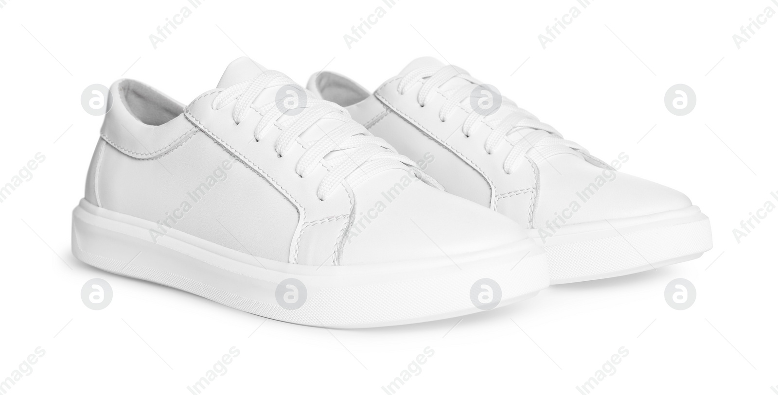 Photo of Pair of stylish sneakers isolated on white