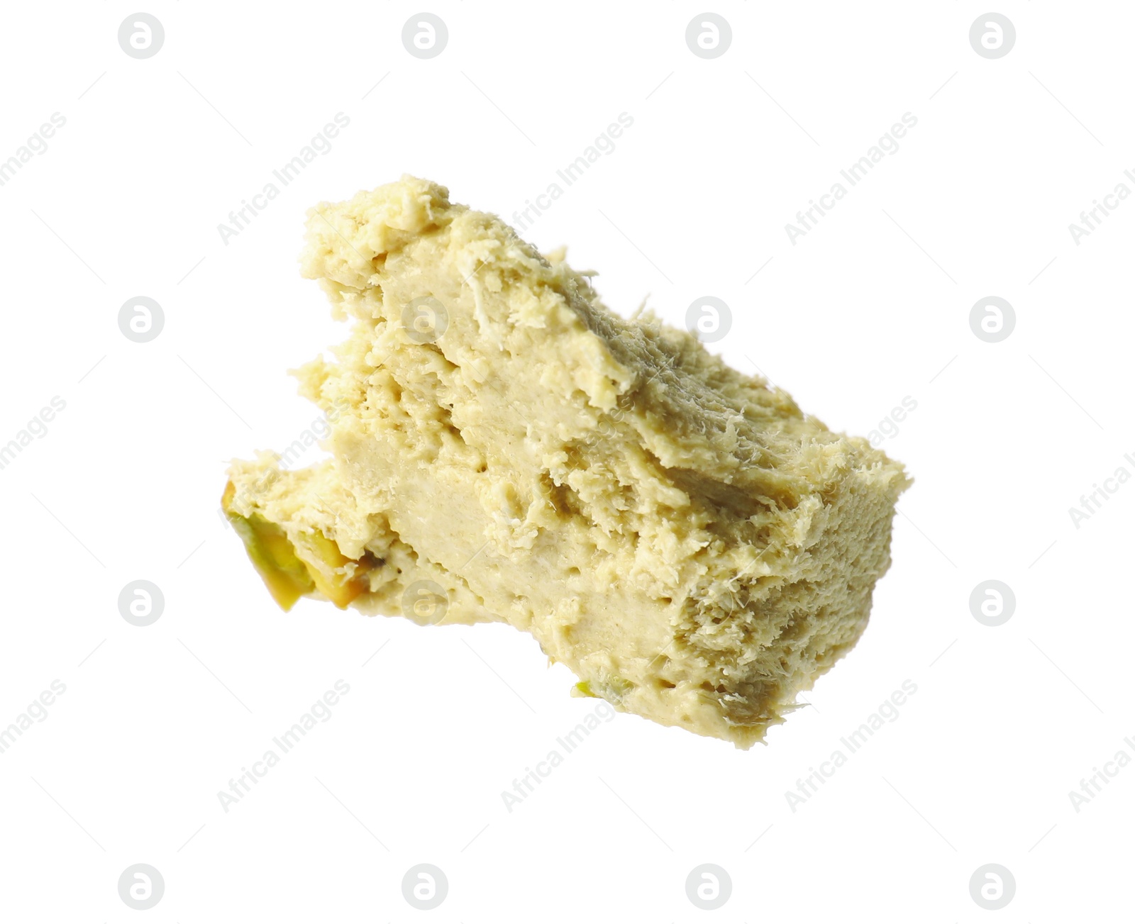 Photo of Piece of tasty pistachio halva isolated on white