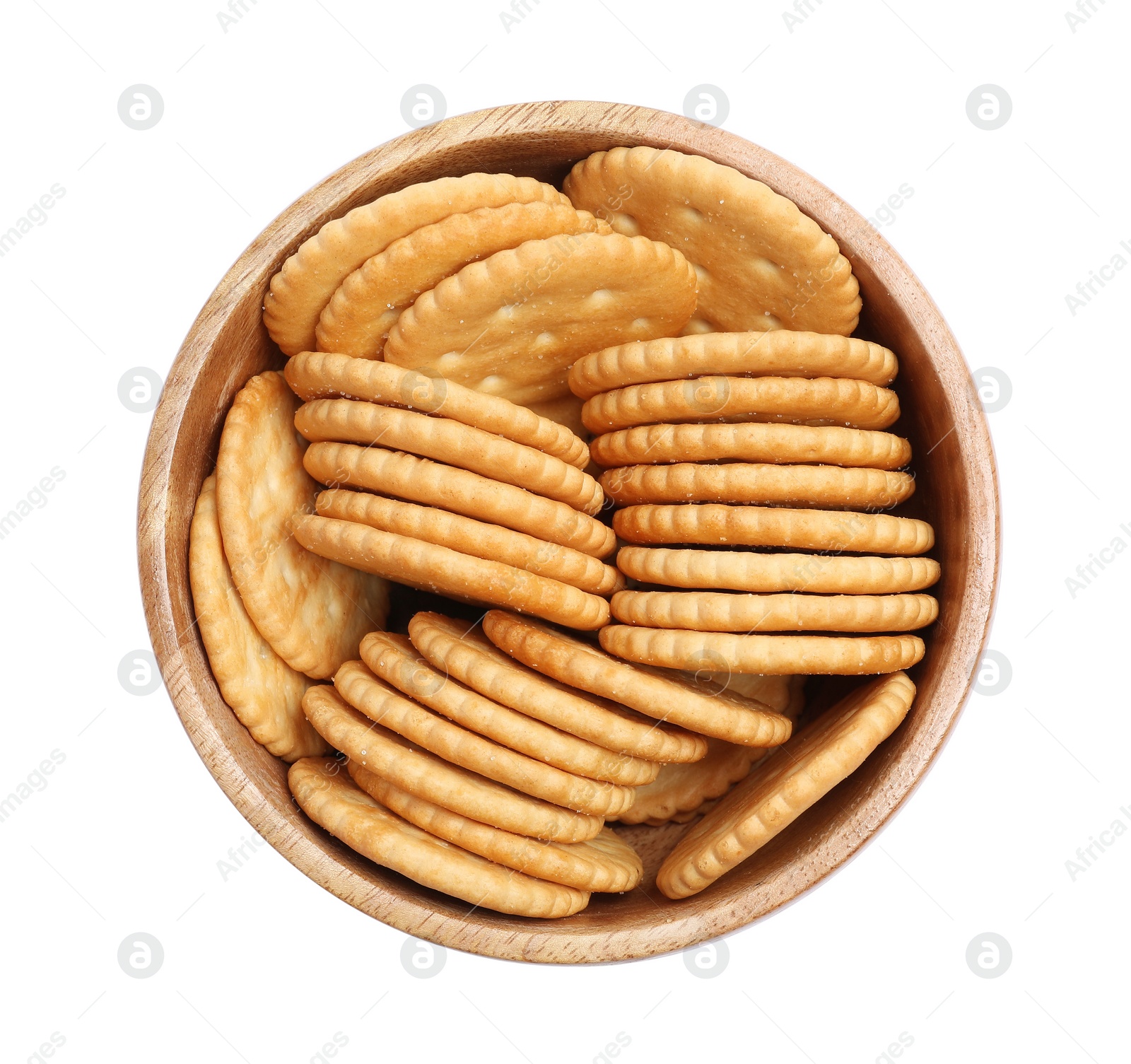 Photo of Tasty crackers in bowl isolated on white, top view