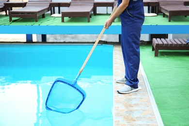 Photo of Male worker cleaning outdoor pool with scoop net