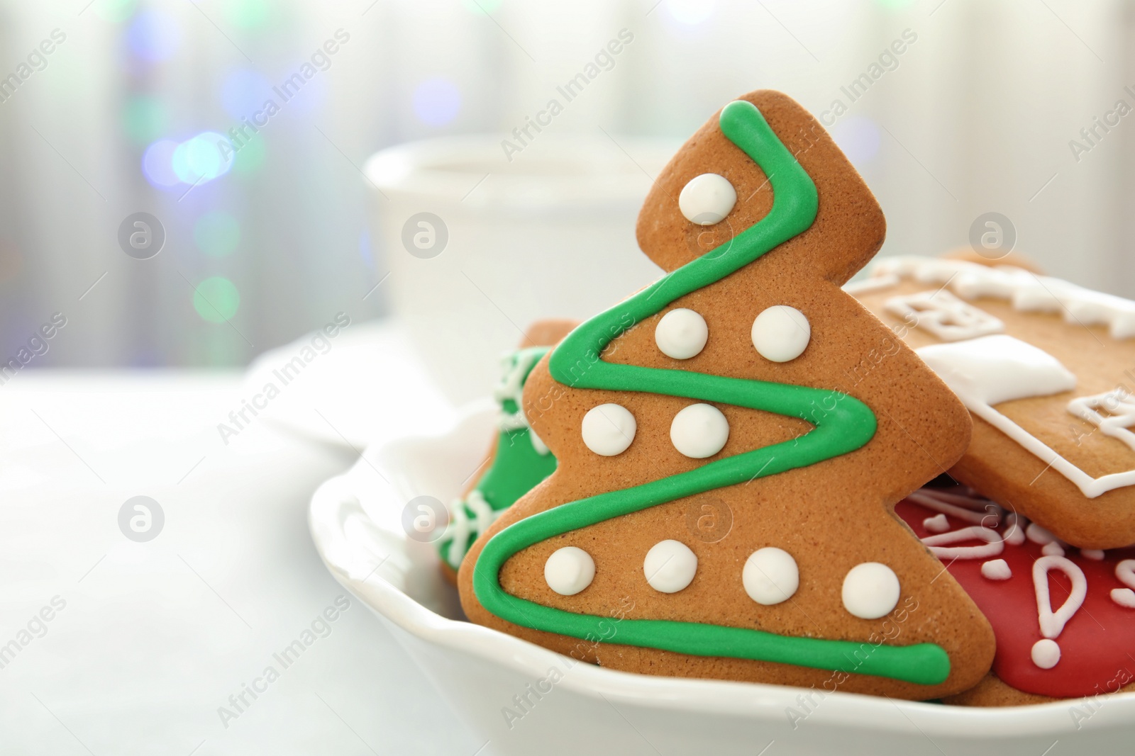 Photo of Plate with tasty homemade Christmas cookies, closeup