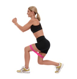 Photo of Woman exercising with elastic resistance band on white background