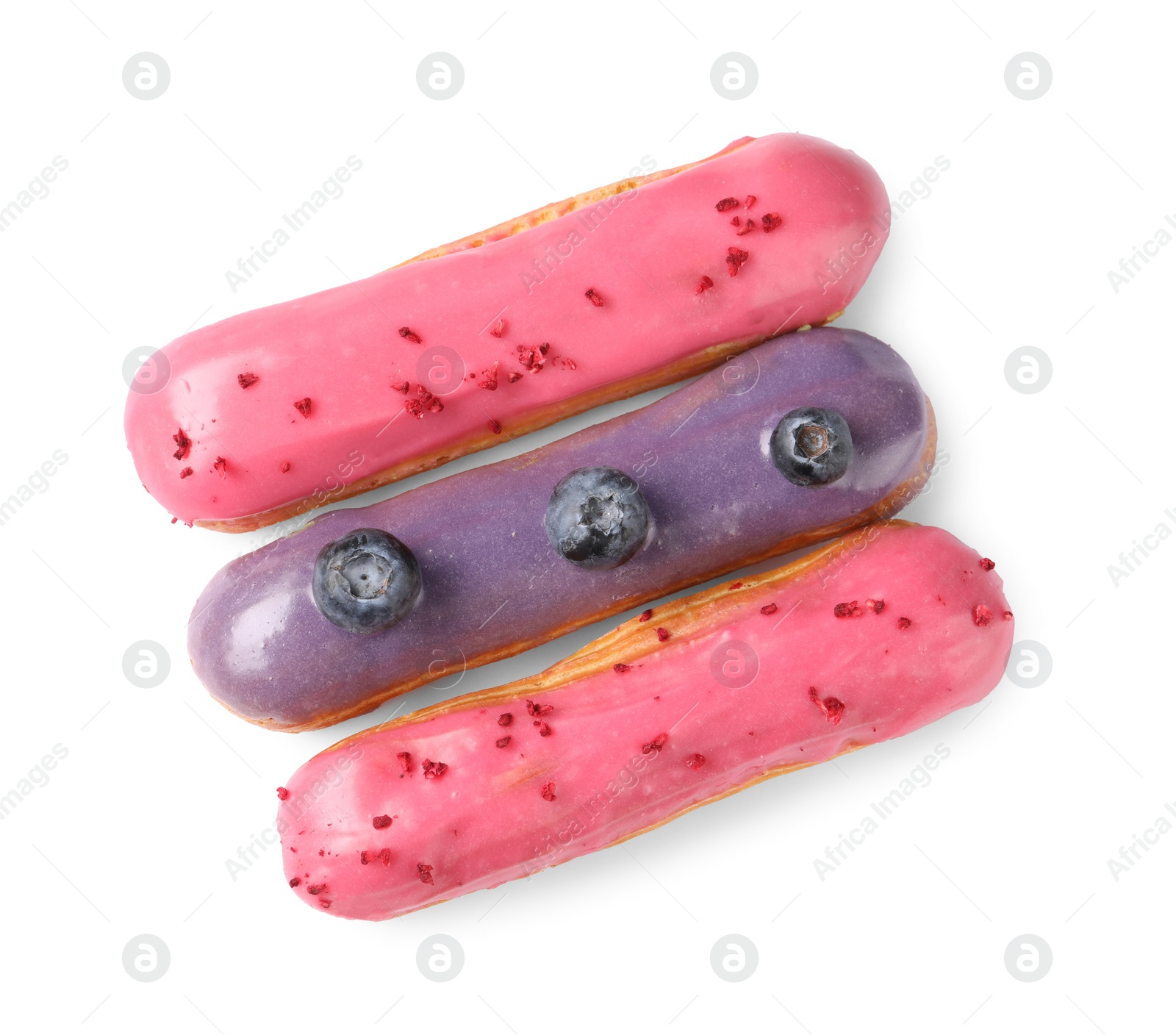 Photo of Delicious eclairs covered with glaze isolated on white, top view