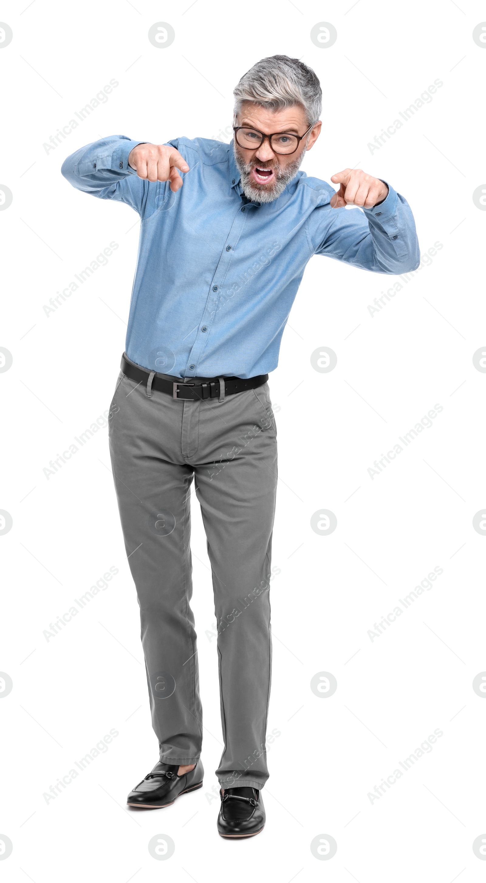 Photo of Mature businessman in stylish clothes posing on white background