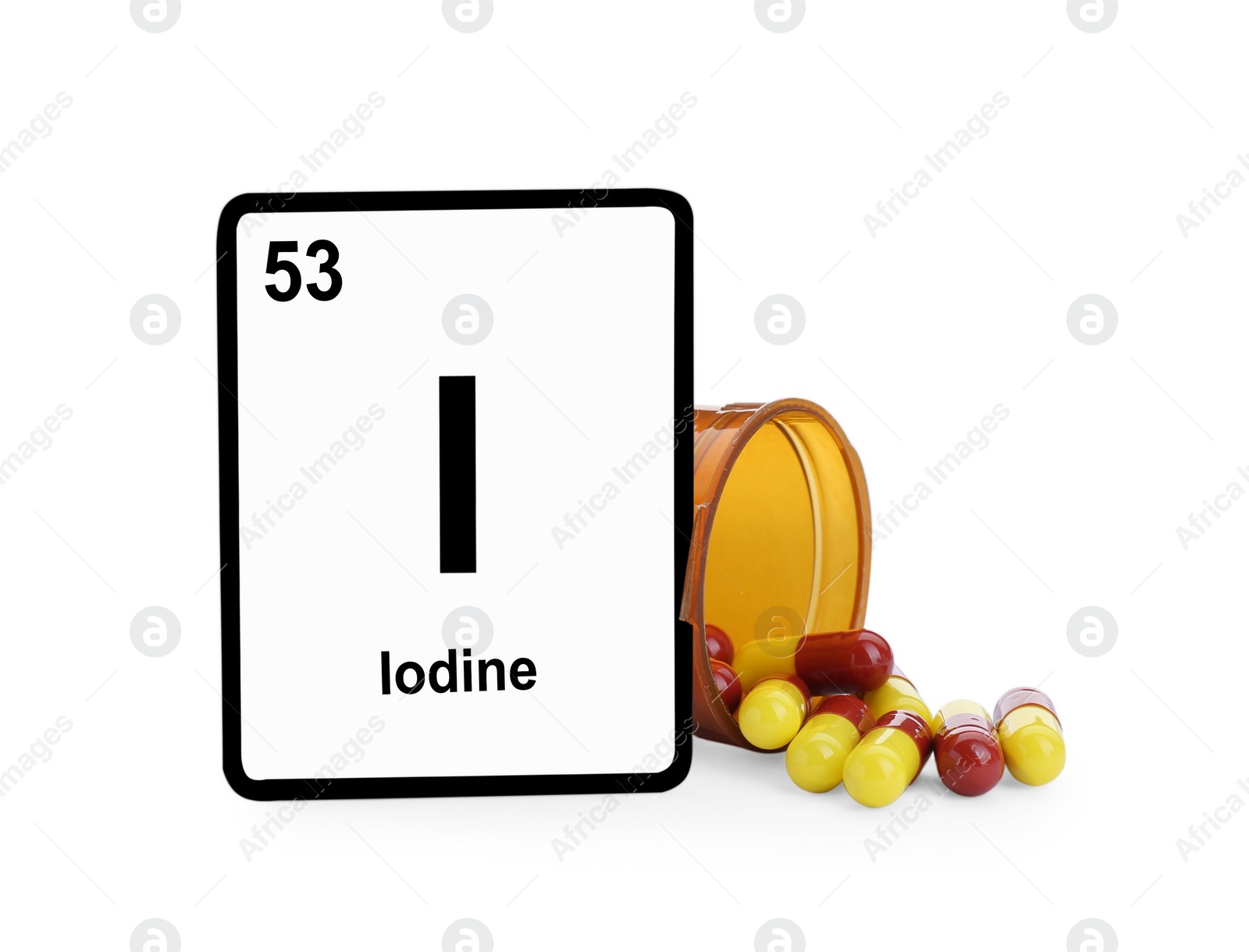 Photo of Card with iodine element, jar and pills isolated on white