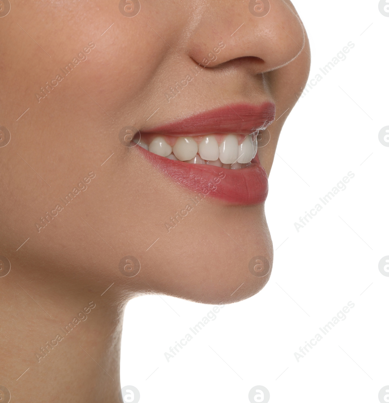 Photo of Happy young woman with healthy teeth on white background, closeup