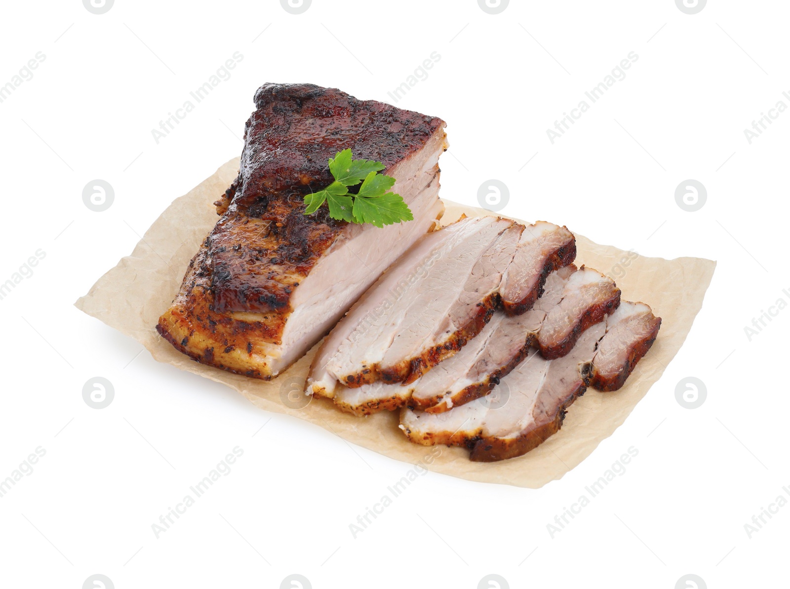 Photo of Pieces of tasty baked pork belly with parsley isolated on white