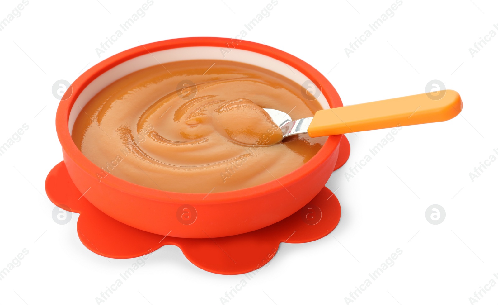 Photo of Bowl and spoon with tasty pureed baby food isolated on white