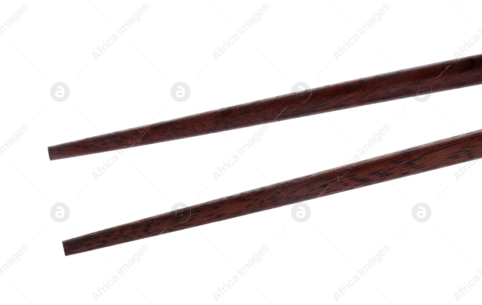 Photo of Pair of wooden chopsticks isolated on white