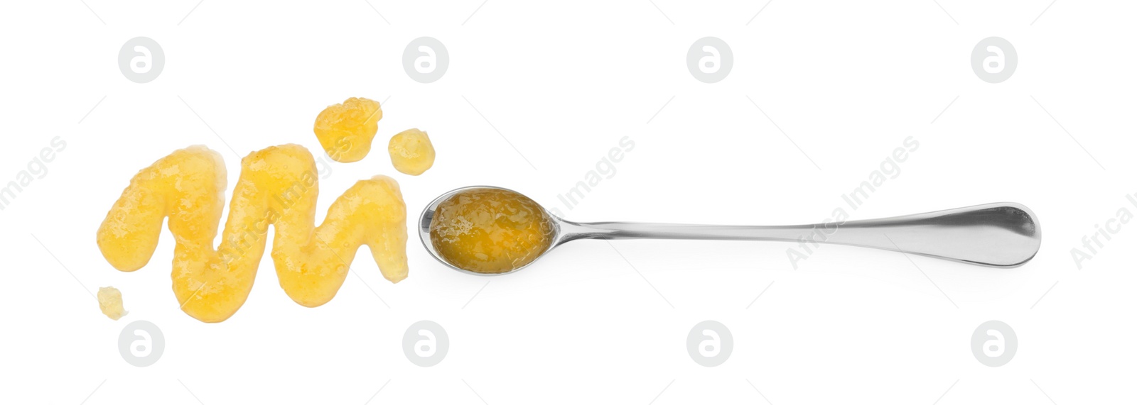 Photo of Tasty sweet jam and spoon isolated on white, top view