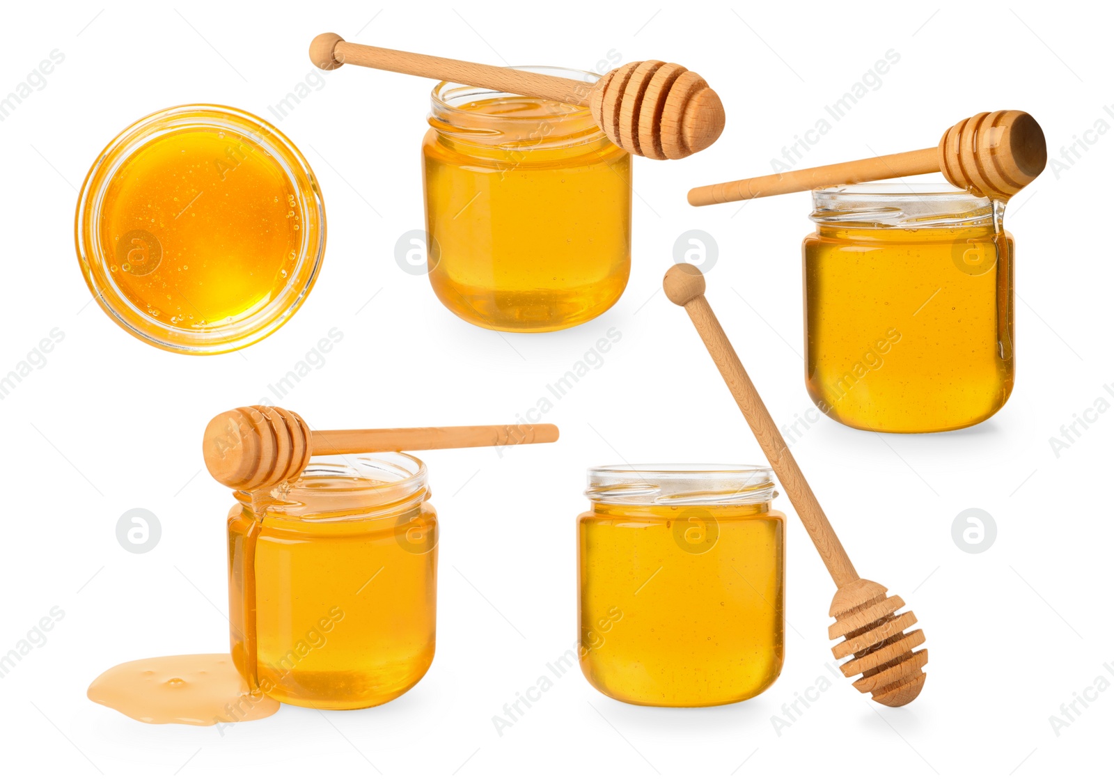 Image of Natural honey in glass jars and dippers isolated on white, set