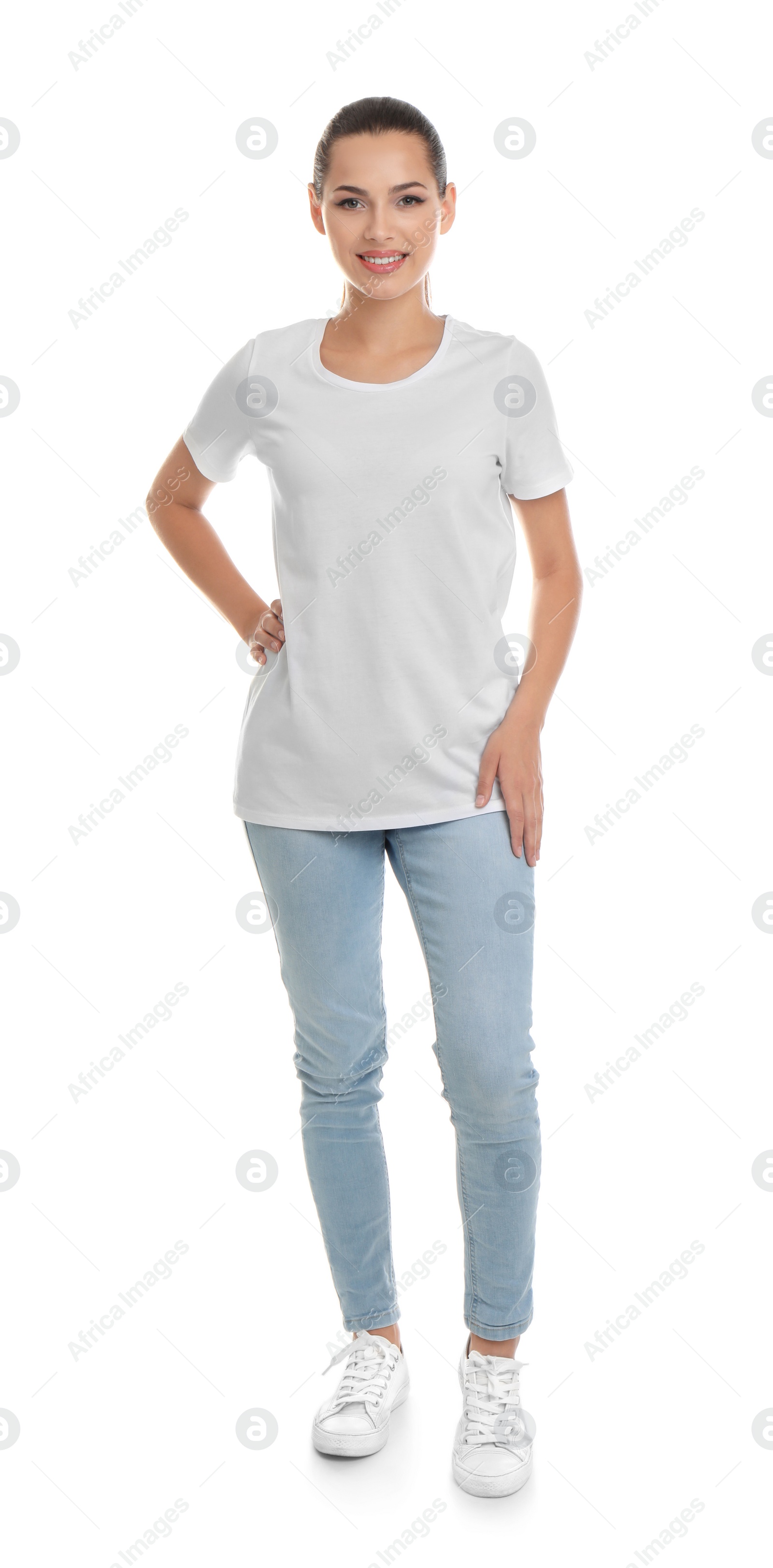 Photo of Young woman in t-shirt on white background. Mockup for design