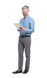 Photo of Mature businessman in stylish clothes with tablet on white background