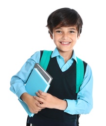 Happy boy in school uniform on white background