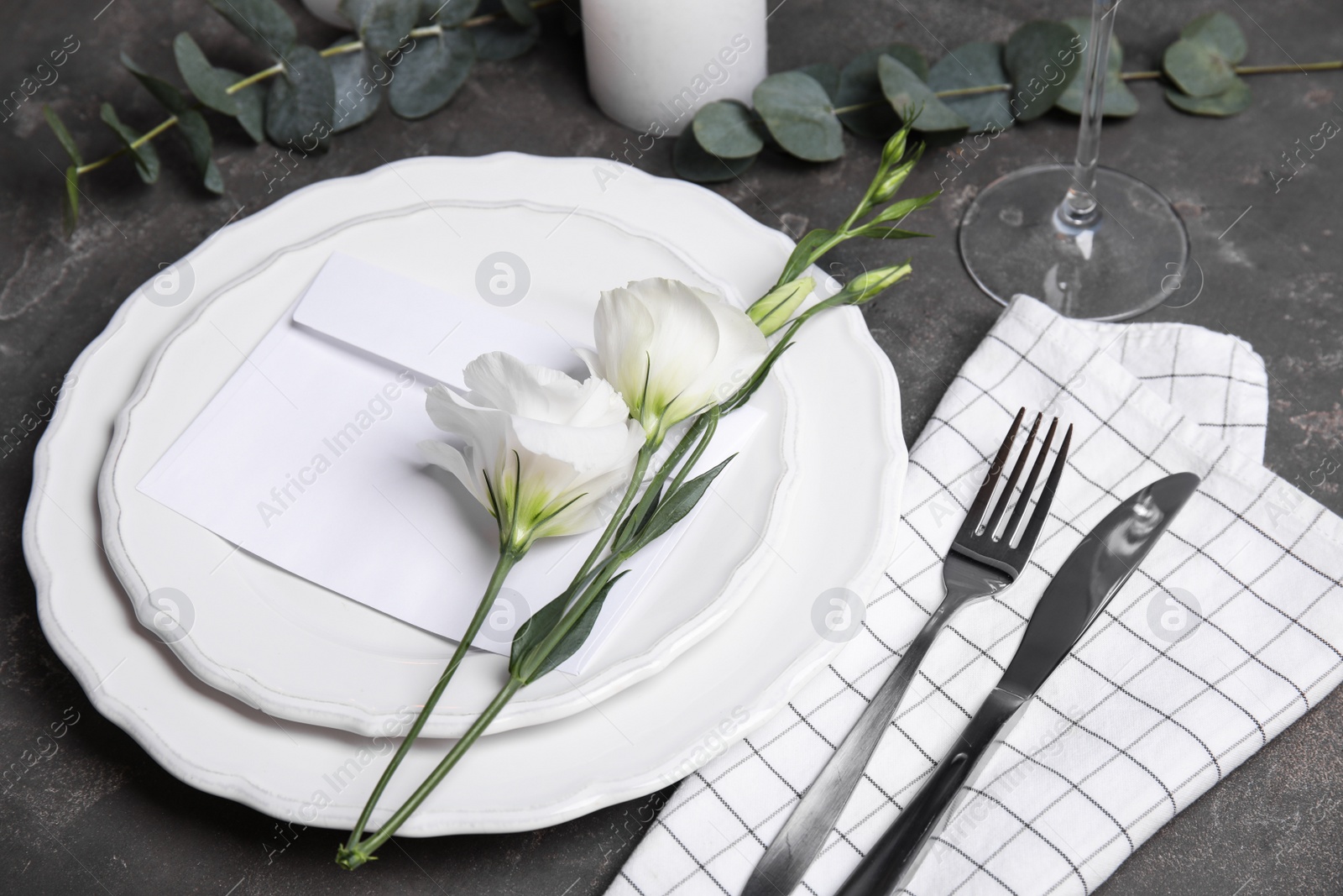 Photo of Elegant festive table setting on dark grey background