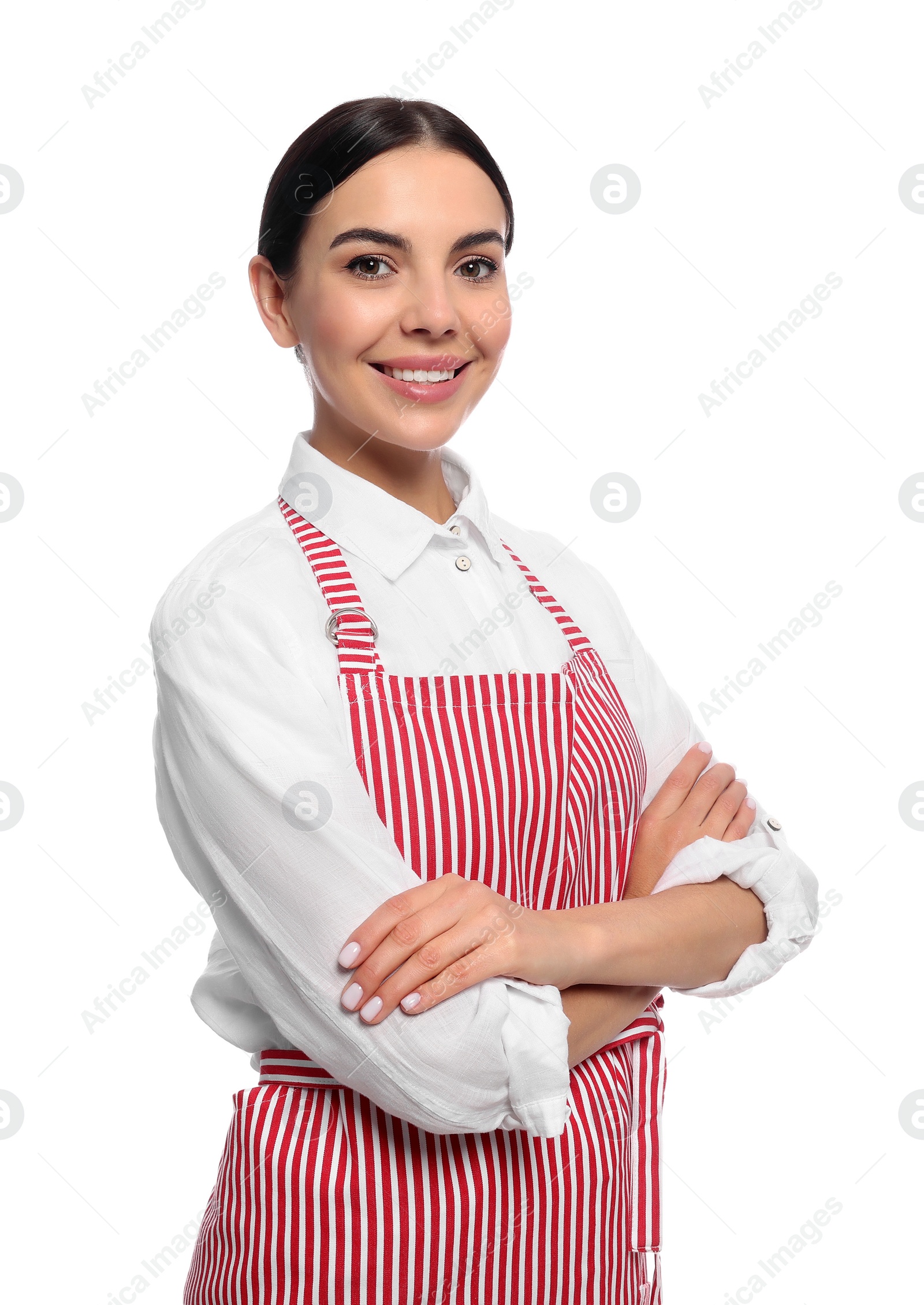 Photo of Young woman in red striped apron on white background