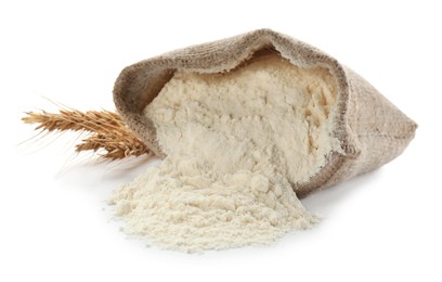 Photo of Flour in bag and spikelets on white background