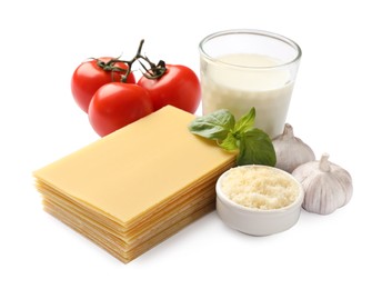 Uncooked ingredients for lasagna isolated on white