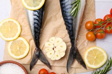 Flat lay composition with tasty raw mackerel on white textured table