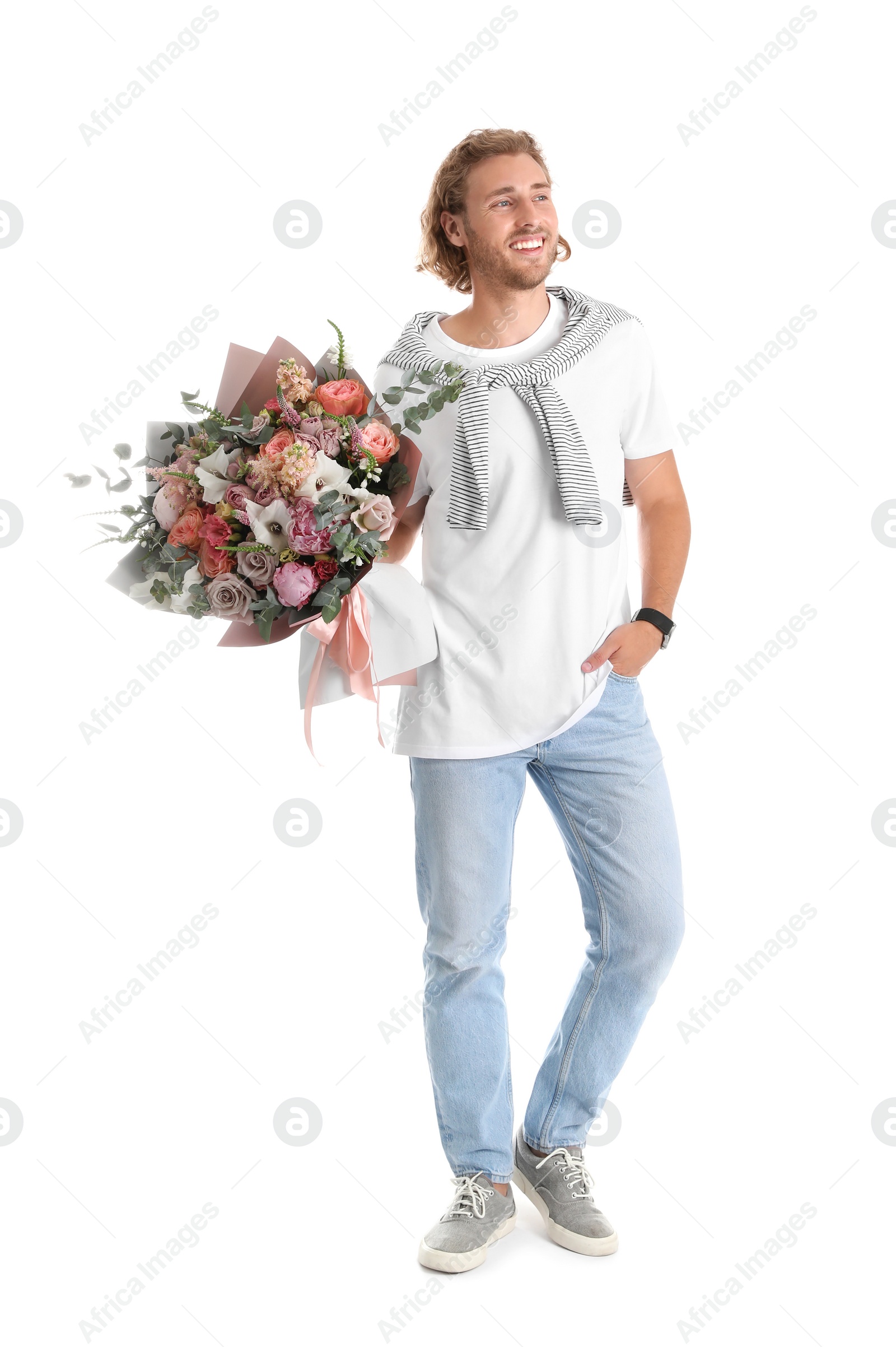 Photo of Young handsome man with beautiful flower bouquet on white background