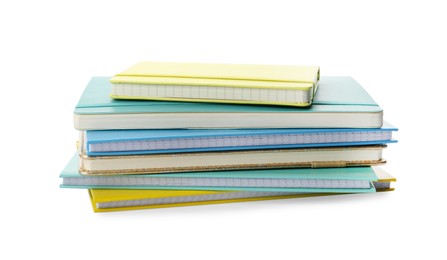 Photo of Stack of different colorful hardcover planners on white background
