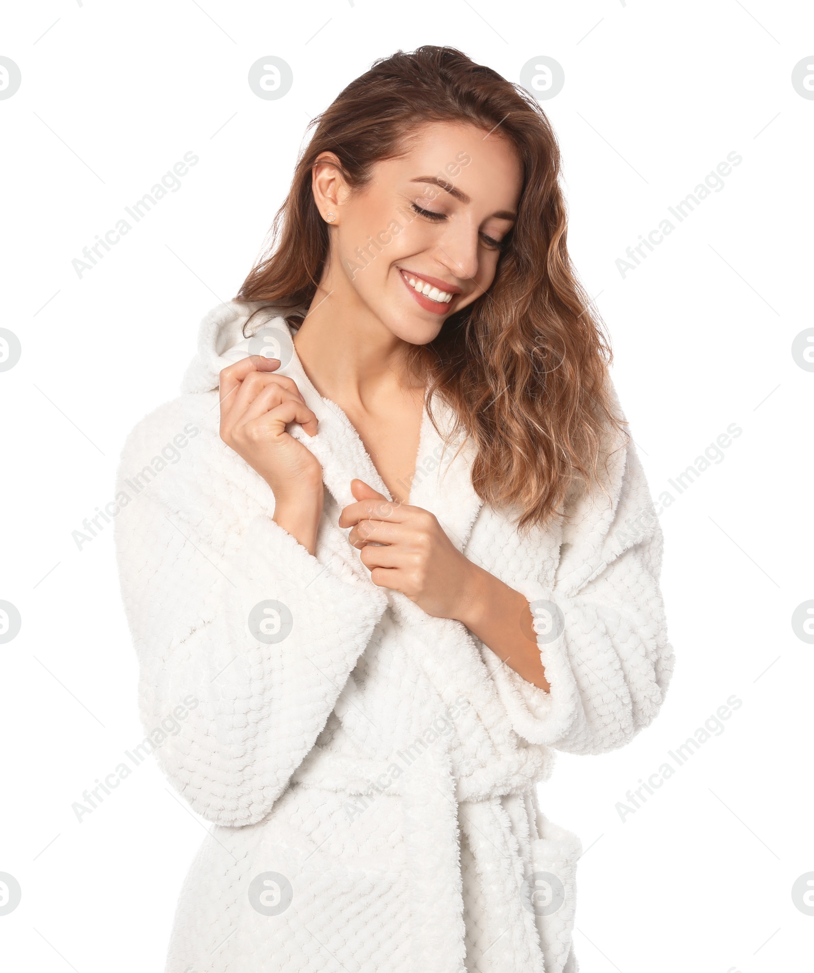 Photo of Beautiful young woman wearing bathrobe on white background