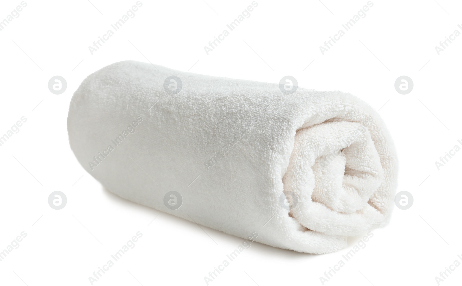 Photo of Rolled soft terry towel on white background