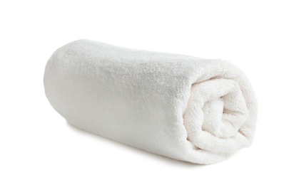 Rolled soft terry towel on white background