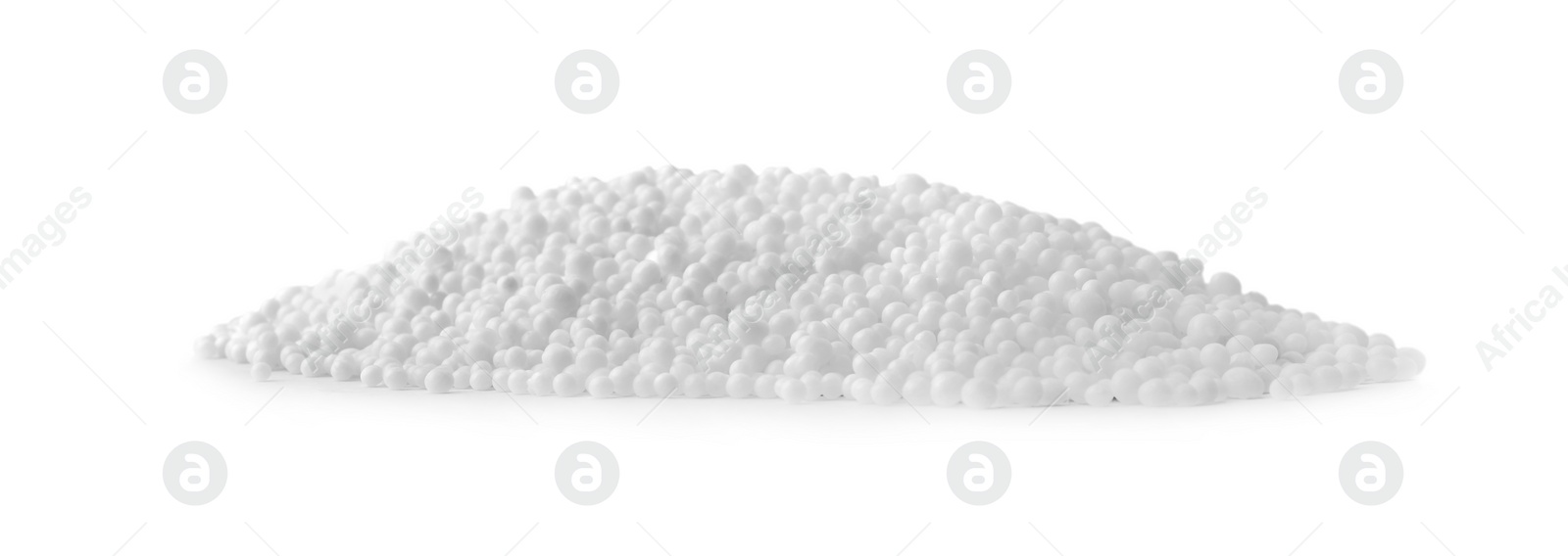 Photo of Pellets of ammonium nitrate on light grey background. Mineral fertilizer