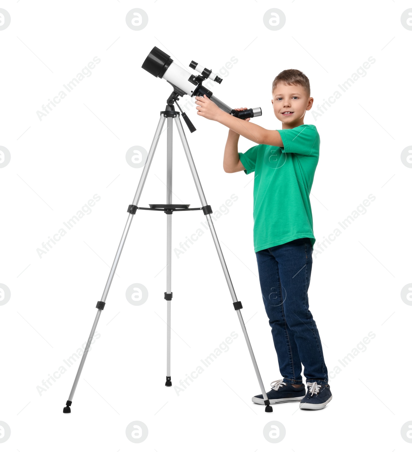 Photo of Happy little boy with telescope on white background