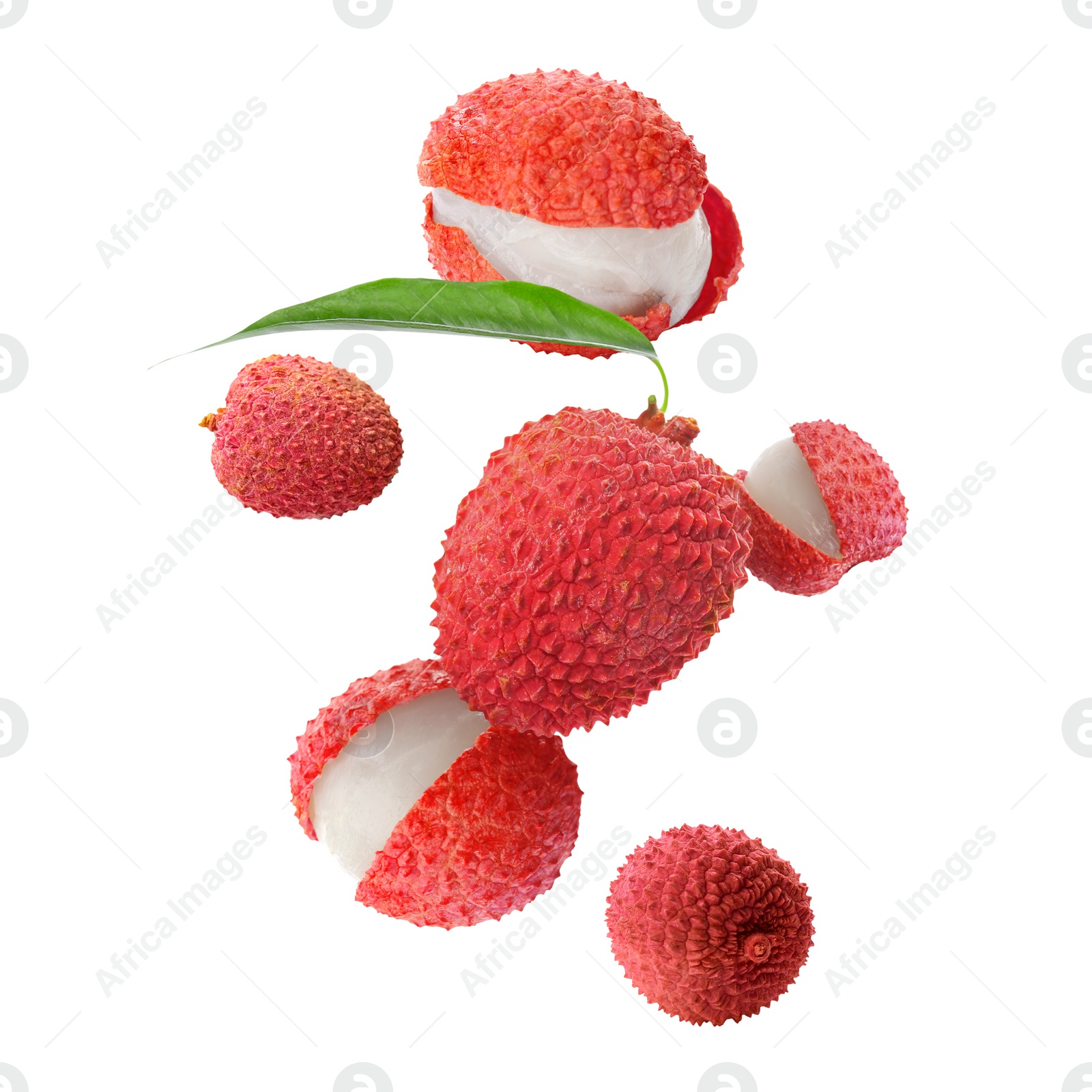 Image of Many lychees falling on white background. Exotic fruit