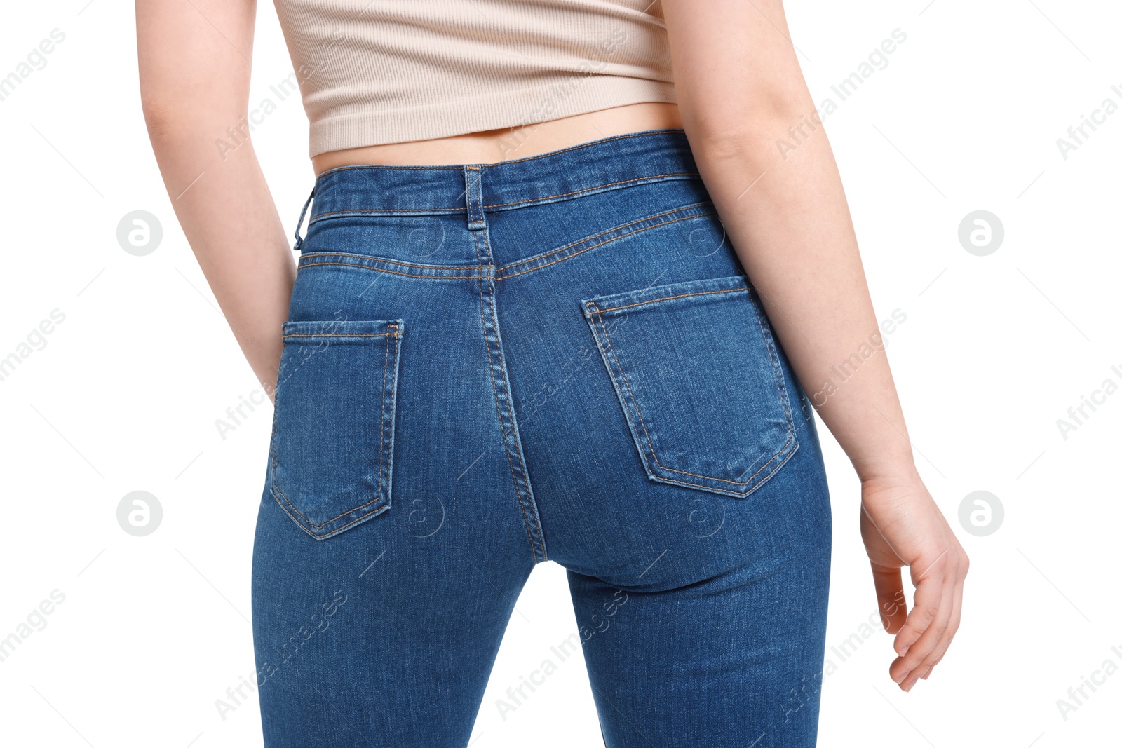 Photo of Woman in stylish jeans on white background, closeup