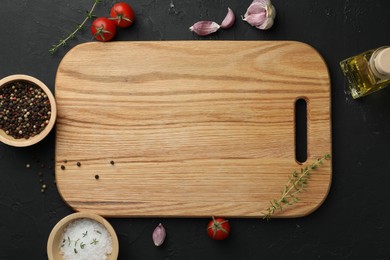 Photo of Cutting board, fresh tomatoes and different spices on grey textured table, flat lay